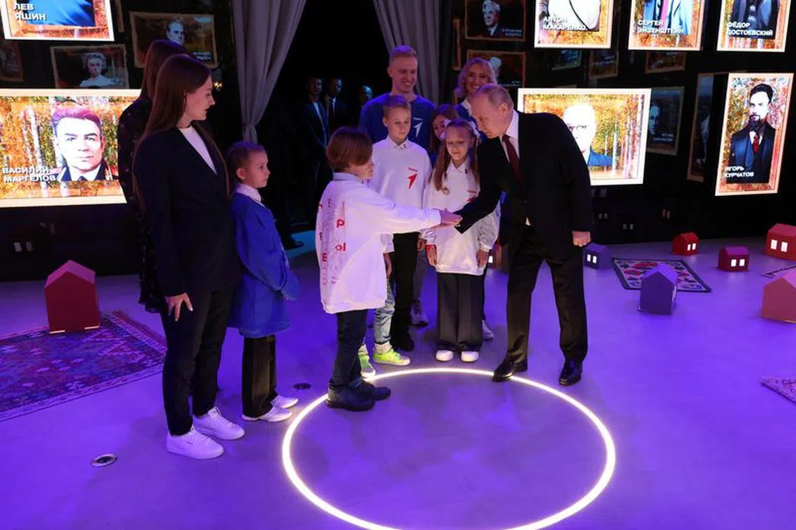 Russian President Vladimir Putin visits the \"Russia\" forum and exhibition celebrating the country's major achievements in Moscow, Russia, December 4, 2023. Sputnik/Mikhail Klimentyev/Kremlin via REUTERS