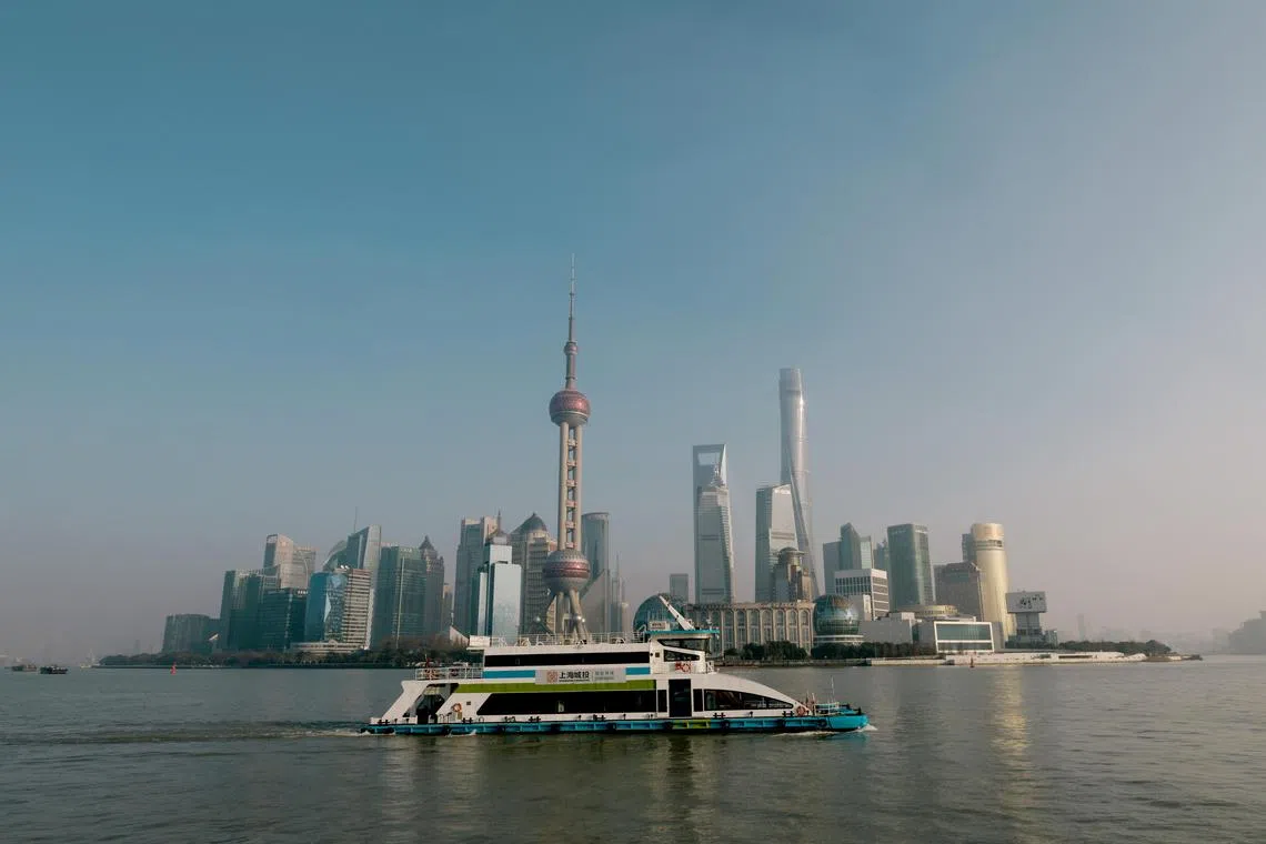 epa11070664 A general view of Shanghai's Lujiazui  financial district, across Huangpu River, China, 11 January 2024 (issued 12 January 2024). According to China's General Administration of Customs, the country's trade surplus in December 2023 was 75.34 billion dollars, up from 70.65 billion in the same period the previous year, exceeding market forecasts. The increase was due to exports rising by 2.3 percent, also higher than the expected growth, while imports increased by 0.2 percent.  EPA-EFE/ALEX PLAVEVSKI