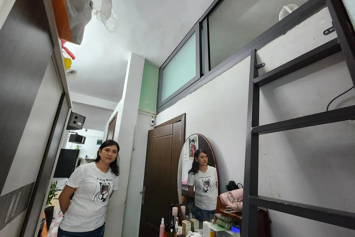 hyhome - Ms Dang Tuyet Huong, a midwife, pictured in the 49sqm Ho Chi Minh City apartment she bought in 2021. She lives there with five family members. 


Byline: Tan Hui Yee