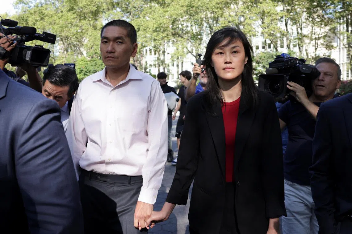 Linda Sun, a former aide to New York State Governor Kathy Hochul, leaving court with husband Chris Hu, on Sept 3.