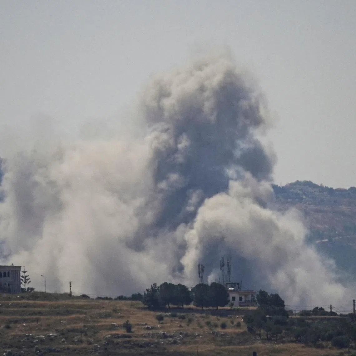 Smoke billows from southern Lebanon, following Israeli strikes, as seen from Nabatieh, Lebanon, June 8, 2026. REUTERS/Stringer