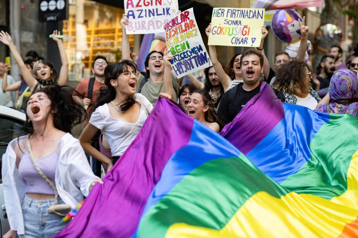 Groups of people carrying rainbow flags marched in the streets of the Sisli district before organisers called on them to disperse.