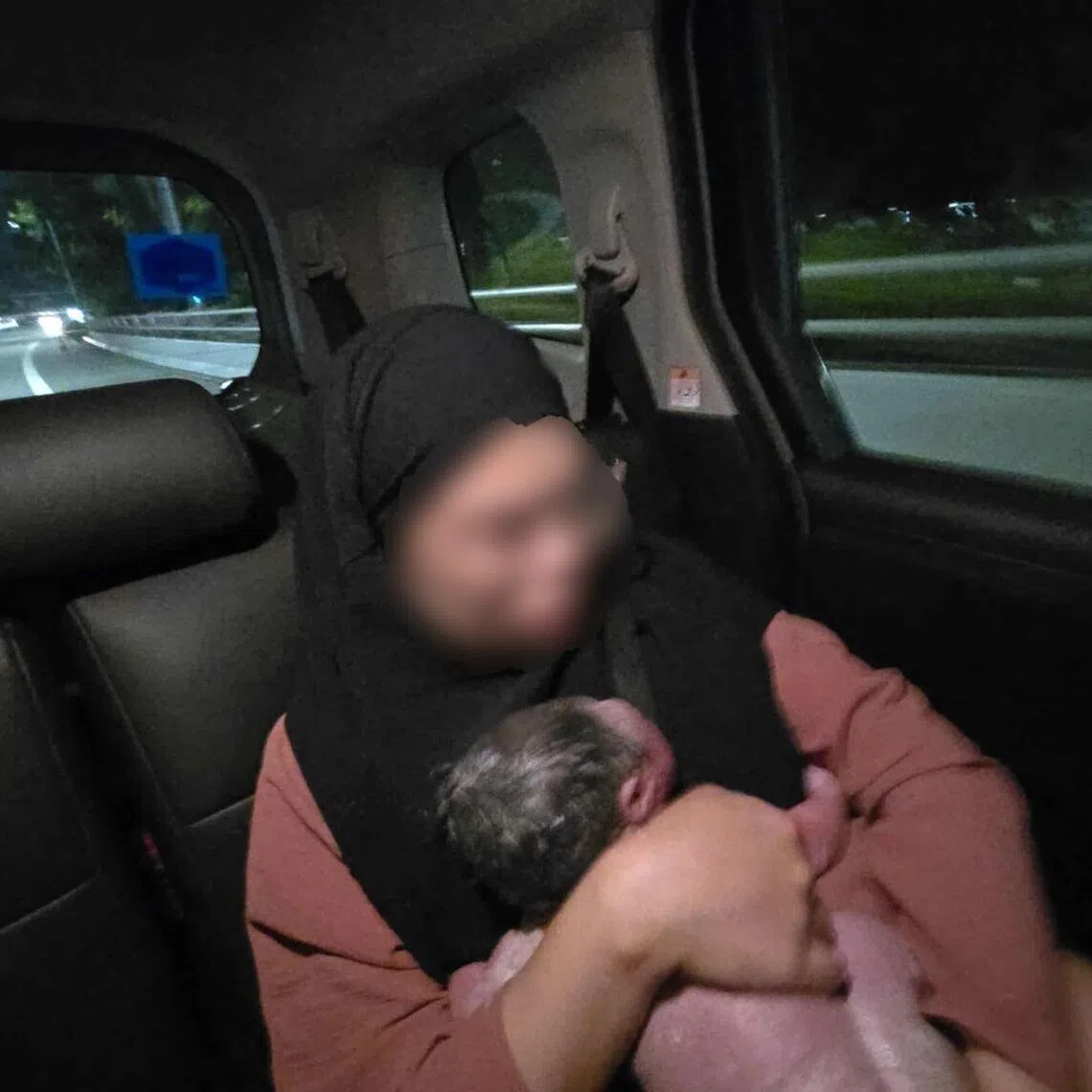 Madam Afifah Rizqin's newborn was neither crying nor moving when she was born in the backseat of a Grab car.