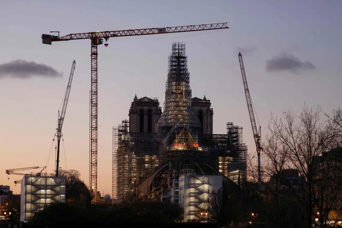 Scaffolding still surrounds the new oak spire, which reaches 96m high.
