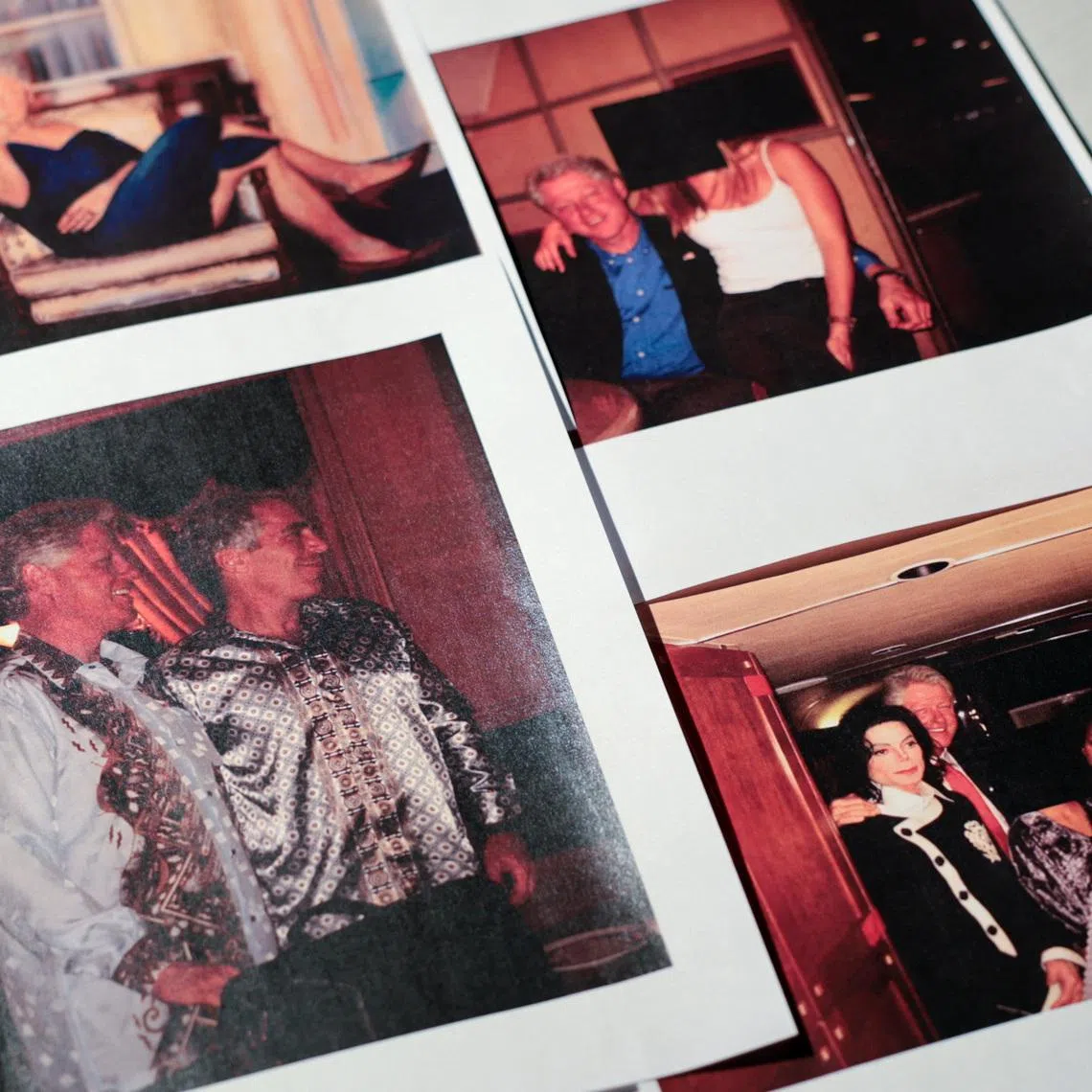 Newly-released documents from Jeffrey Epstein include a number of pictures of former US President Bill Clinton and a photo of a painting depicting Clinton in a blue dress.