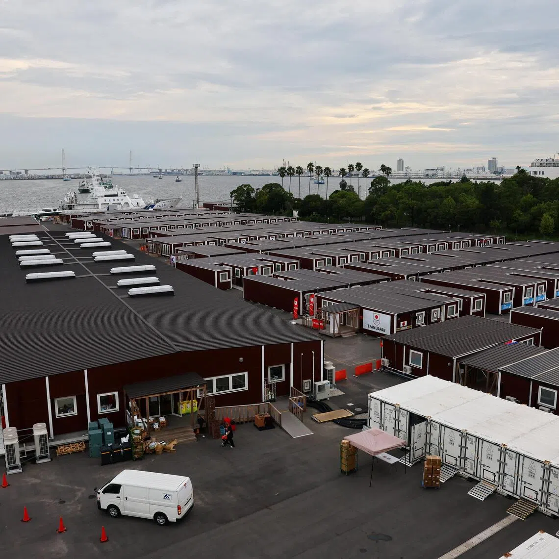Asian Games participants have been put in temporary wooden containers to ease the shortage of accommodation.