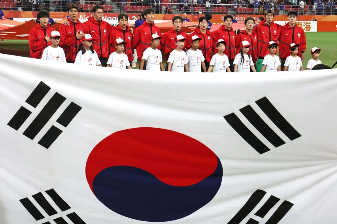 South Korea’s Asian Games gold-winning football team has faced backlash from fans after the behaviour of some players who earned exemptions from mandatory military service.