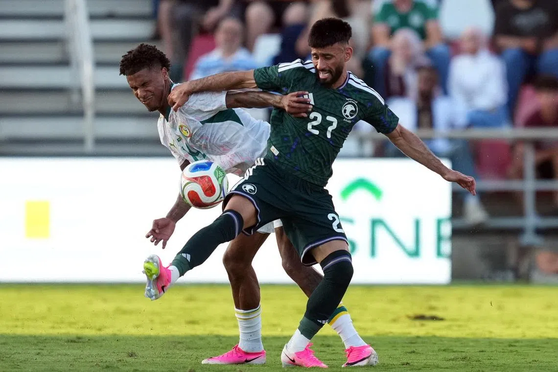 Soccer Football - International Friendly - Saudi Arabia v Senegal - Toyota Field, San Antonio, Texas, U.S. - June 9, 2026  Saudi Arabia's Sultan Mandash in action with Senegal's Moussa Niakhate IMAGN IMAGES via Reuters/Daniel Dunn