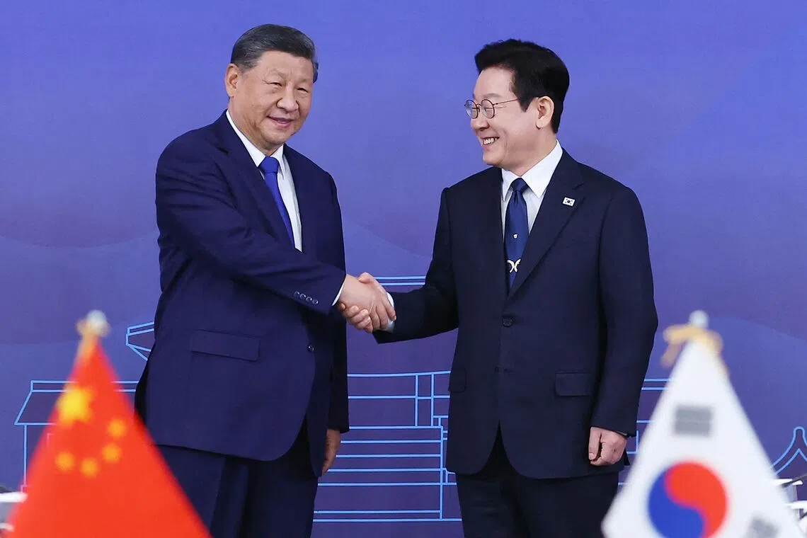 Chinese President Xi Jinping (left) sat down for his first summit with South Korean President Lee Jae Myung on the last day of the Apec forum.