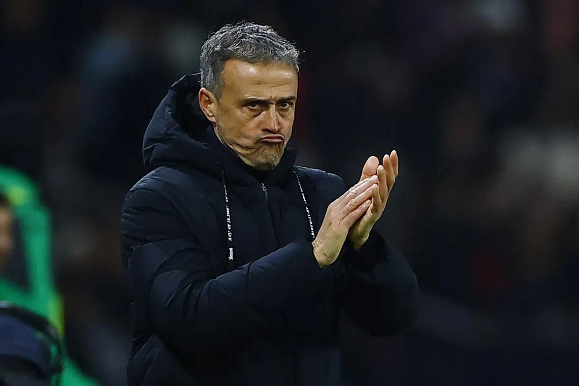 FILE PHOTO: Soccer Football - Ligue 1 - Paris St Germain v AS Saint-Etienne - Parc des Princes, Paris, France - January 12, 2025 Paris St Germain coach Luis Enrique applauds fans after the match REUTERS/Sarah Meyssonnier/File Photo