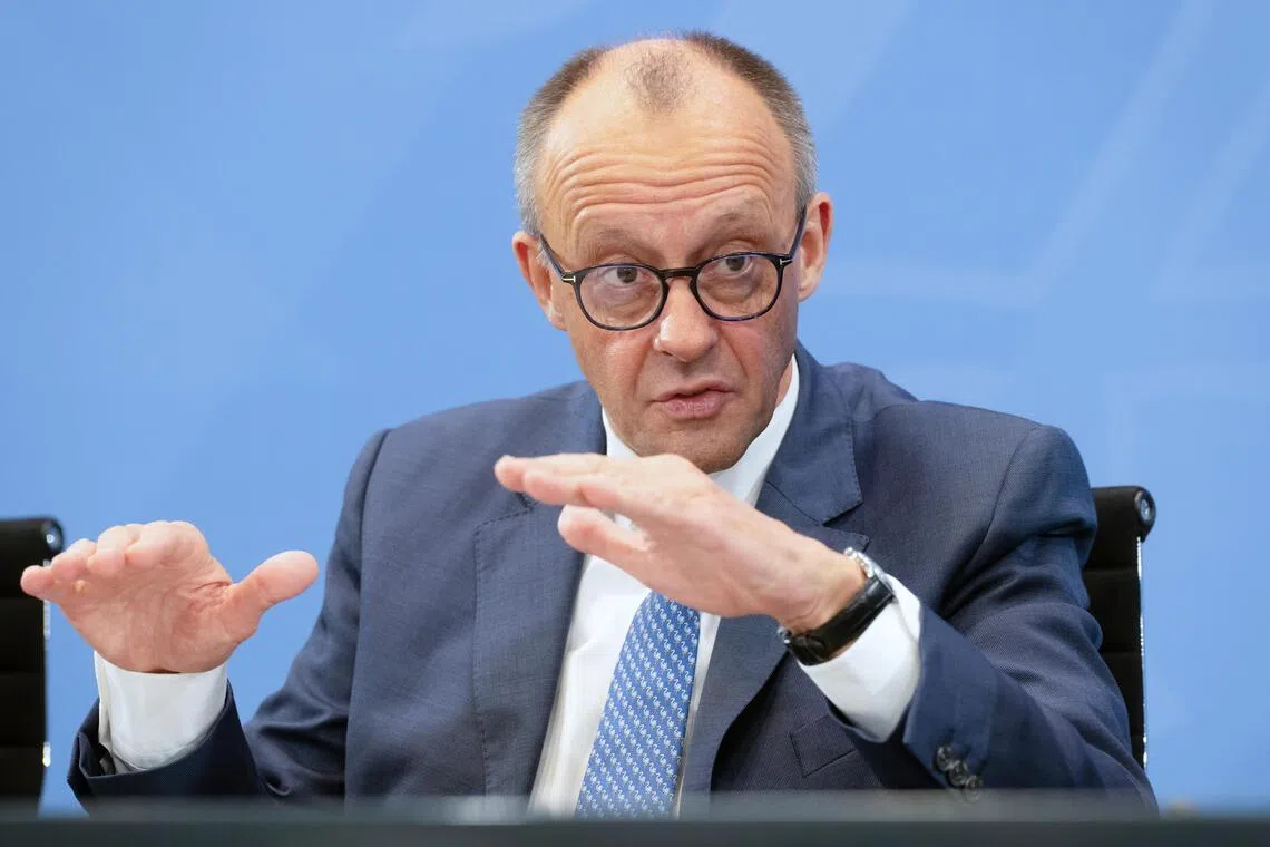 German Chancellor Friedrich Merz giving a press conference on Nov 28 in Berlin.