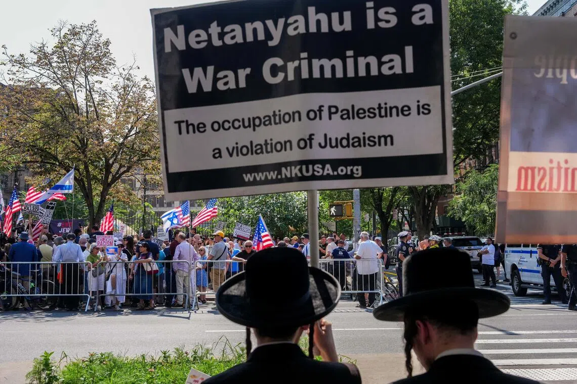 Ultra-Orthodox Jews from the anti-Zionist Neturei Karta organisation counter-protest as people attend a pro-Jewish rally in opposition to New York City Mayor Zohran Mamdani in New York City on July 26.