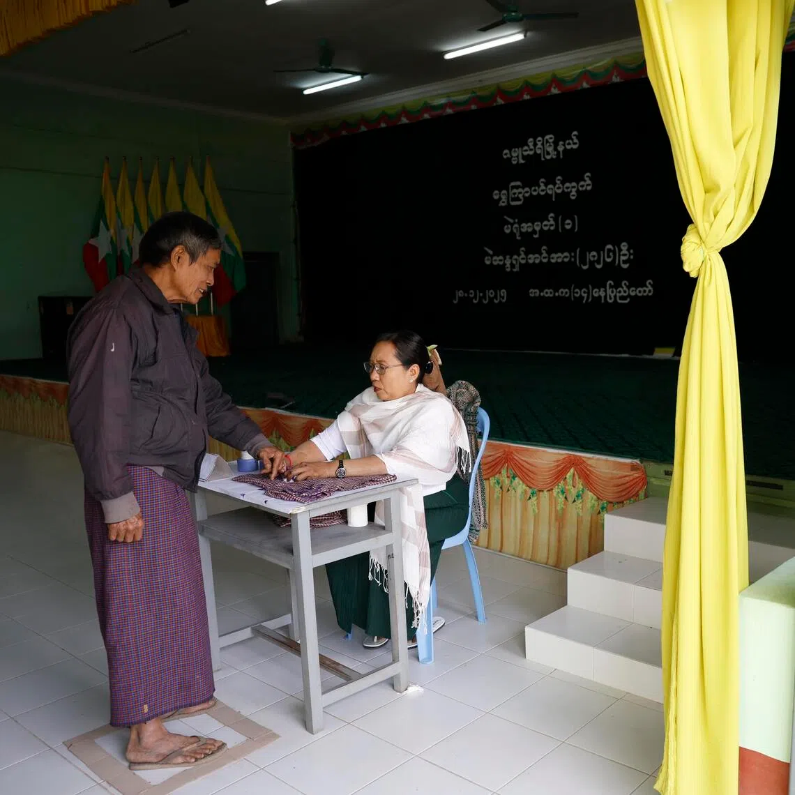 A voter at a polling station in Myanmar's Naypyitaw on Dec 28.