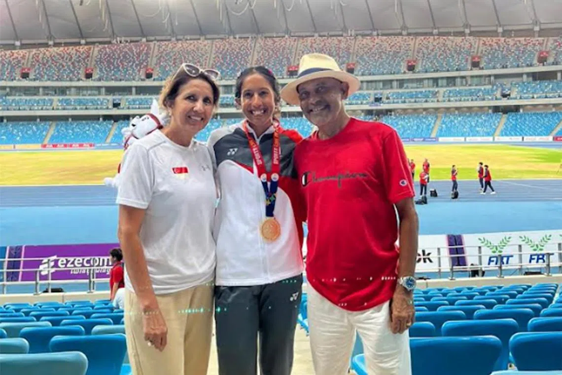 Shanti Pereira's dad Clarence and mum Jeet are proud as their daughter wins the 100m gold to go along with her 200m win.