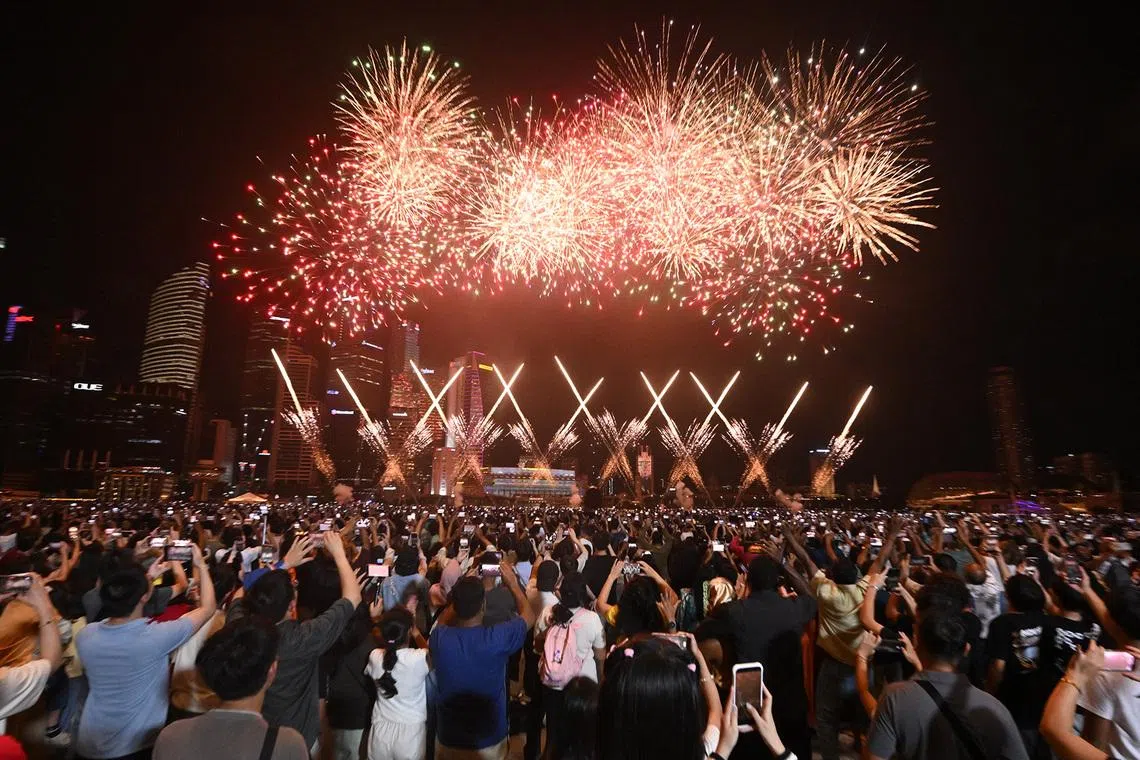 Crowds welcoming the new year during the fireworks display in Marina Bay on Jan 1, 2026.