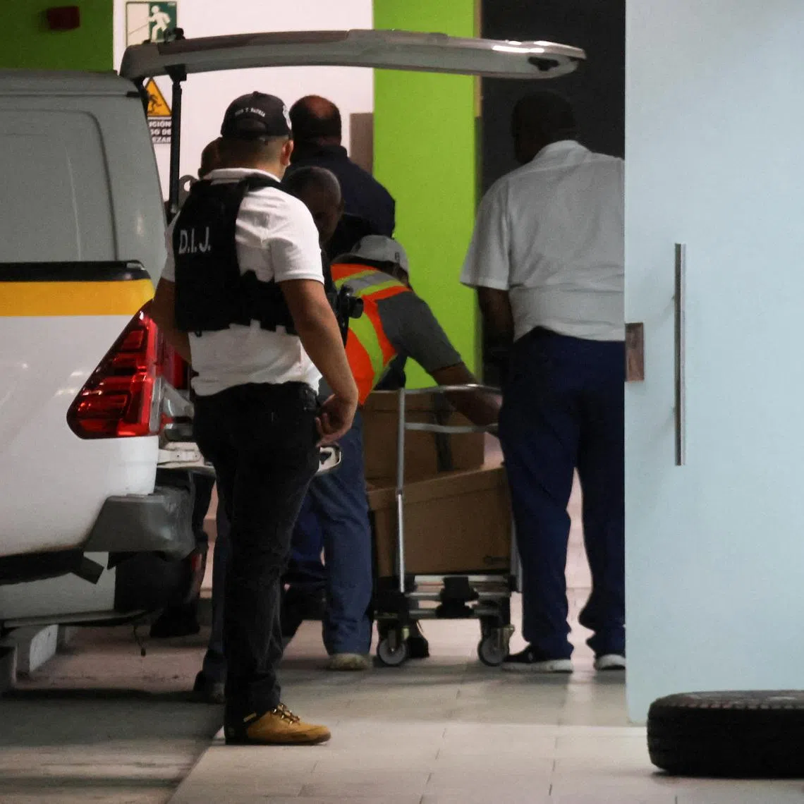 Members of Panama’s investigative police conduct a search at offices tied to the Panama Ports Company, the local unit of Hong Kong conglomerate CK Hutchison, and load boxes into a truck in an underground parking area in the upscale Albrook district of Panama City, Panama, February 26, 2026. REUTERS/Aris Martinez
