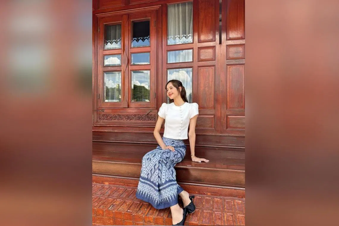 Lisa posted several pictures of her on Instagram wearing an indigo and white sarong, with a white top, while visiting the Ayutthaya heritage site.