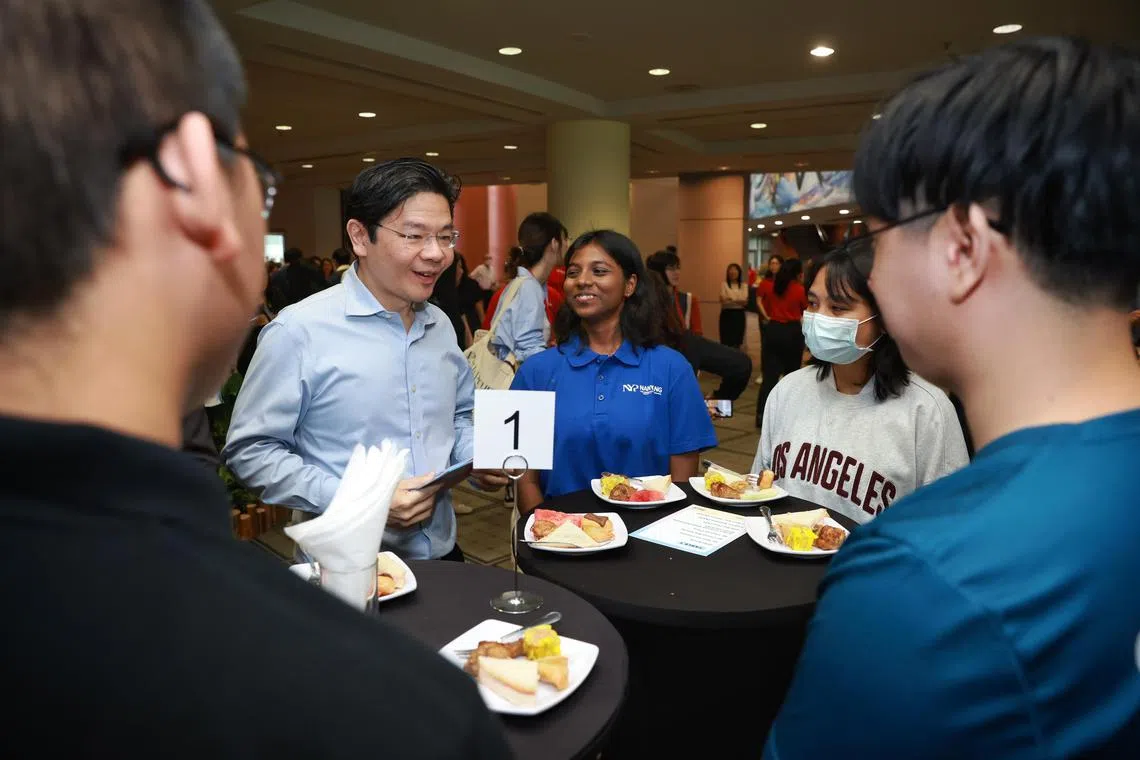 Deputy Prime Minister Lawrence Wong interacting with young leaders during the launch of Lee Kuan Yew Centennial Fund and the Singapore Young Leaders Programme in Nanyang Polytechnic on May 30, 2023. ycwong30