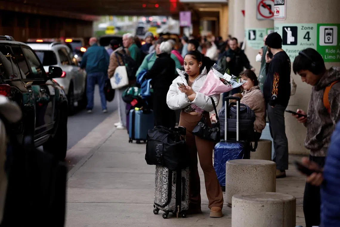Travellers at Ronald Reagan National Airport ahead of the Thanksgiving holiday in Arlington, Virginia on Nov 27. 
