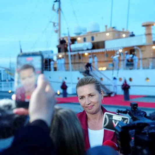 Denmark's acting prime minister Mette Frederiksen speaking to the media near the royal yacht Dannebrog, docked at Odense Harbor, Denmark, on June 1, 2026. 
