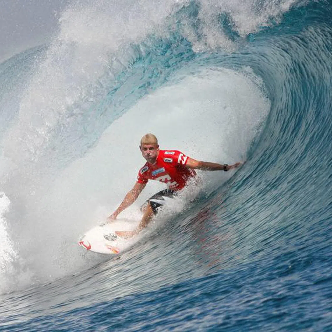FILE PHOTO: Australian surfer Mick Fanning rides a wave at Teahupo'o, Tahiti May 13, 2008.  REUTERS/Joseba Etxaburu/File Photo