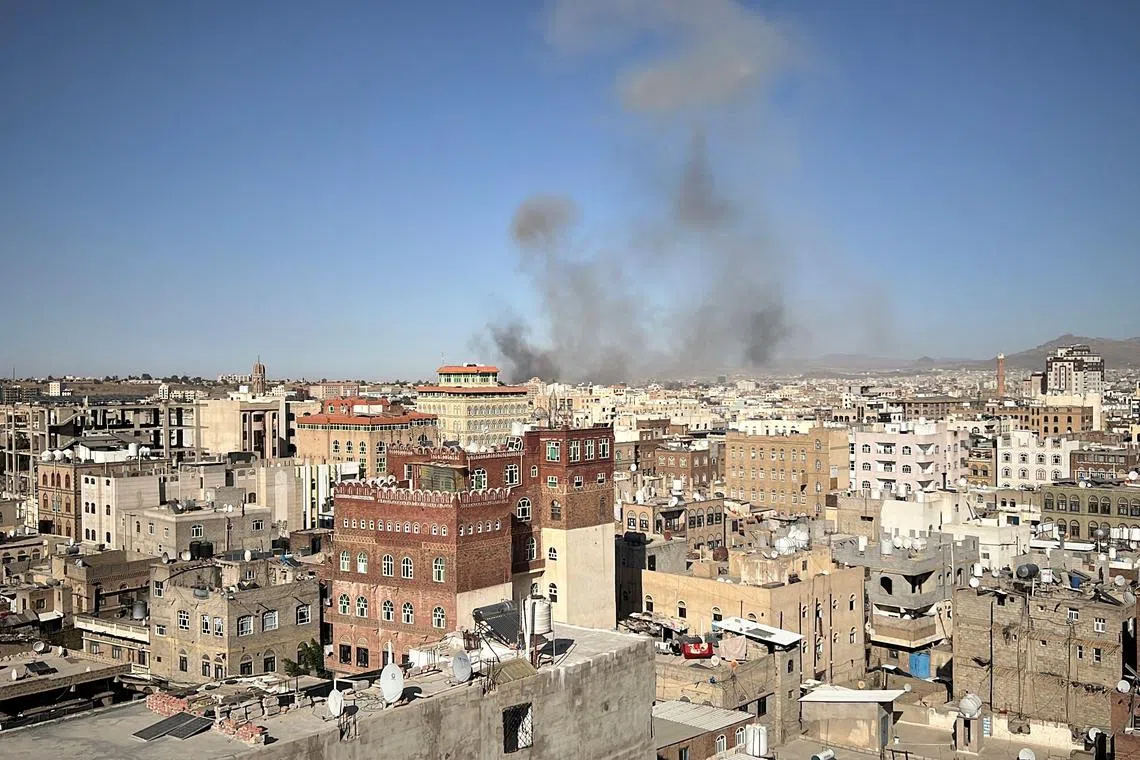 Smoke rises after U.S. strikes in Sanaa, Yemen, December 31, 2024. REUTERS/Adel al-Khadher
