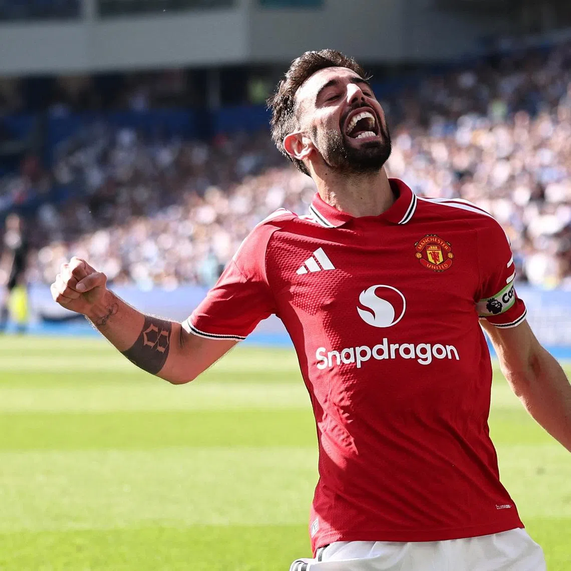 Soccer Football - Premier League - Brighton & Hove Albion v Manchester United - The American Express Community Stadium, Brighton, Britain - May 24, 2026 Manchester United's Bruno Fernandes celebrates scoring their third goal. REUTERS/David Klein