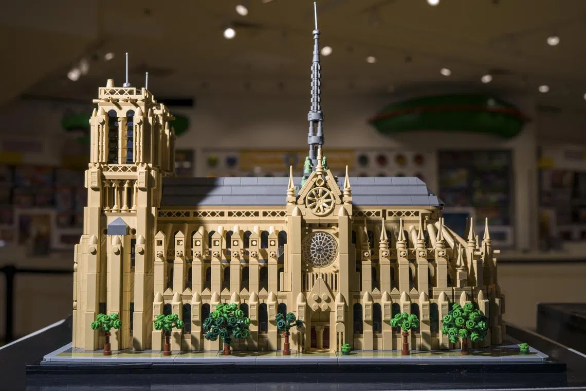 Lego’s new 4,383-brick model of the Cathedral of Notre-Dame, on sale in the Lego Store at Les Halles in Paris on June 1, 2024. The set sells for $229.99 and is notable as the first religious structure that the company has released in 67 years; About 20% of Lego sets are now intended for adult fans of Lego, or ‘AFOLs.’ (Matthew Avignone/The New York Times)
