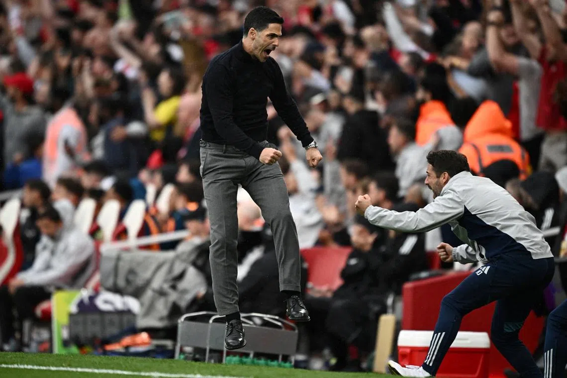 Arsenal manager Mikel Arteta celebrates their second goal, scored by Bukayo Saka.