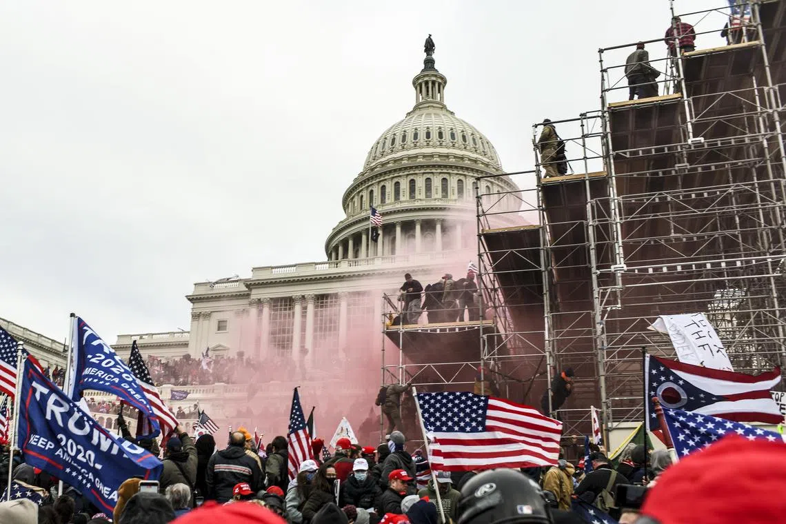 Rioters incited by President Donald Trump breach the Capitol building in Washington, on Jan 6, 2021. 