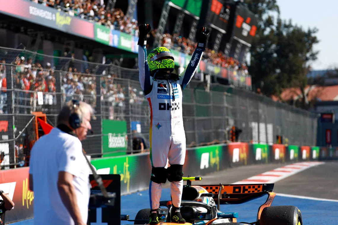 McLaren's Lando Norris celebrates after winning the Mexico City Grand Prix.