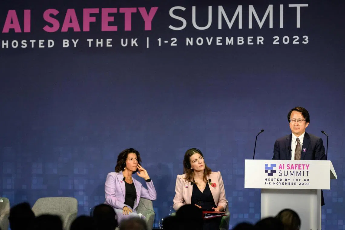 US Commerce Secretary Gina Raimondo (L) and Britain's Science, Innovation and Technology Secretary Michelle Donelan (C) listen as China's Vice-Minister, Ministry of Science and Technology Wu Zhaohui speaks during the UK Artificial Intelligence (AI) Safety Summit at Bletchley Park, in central England, on Nov 1.