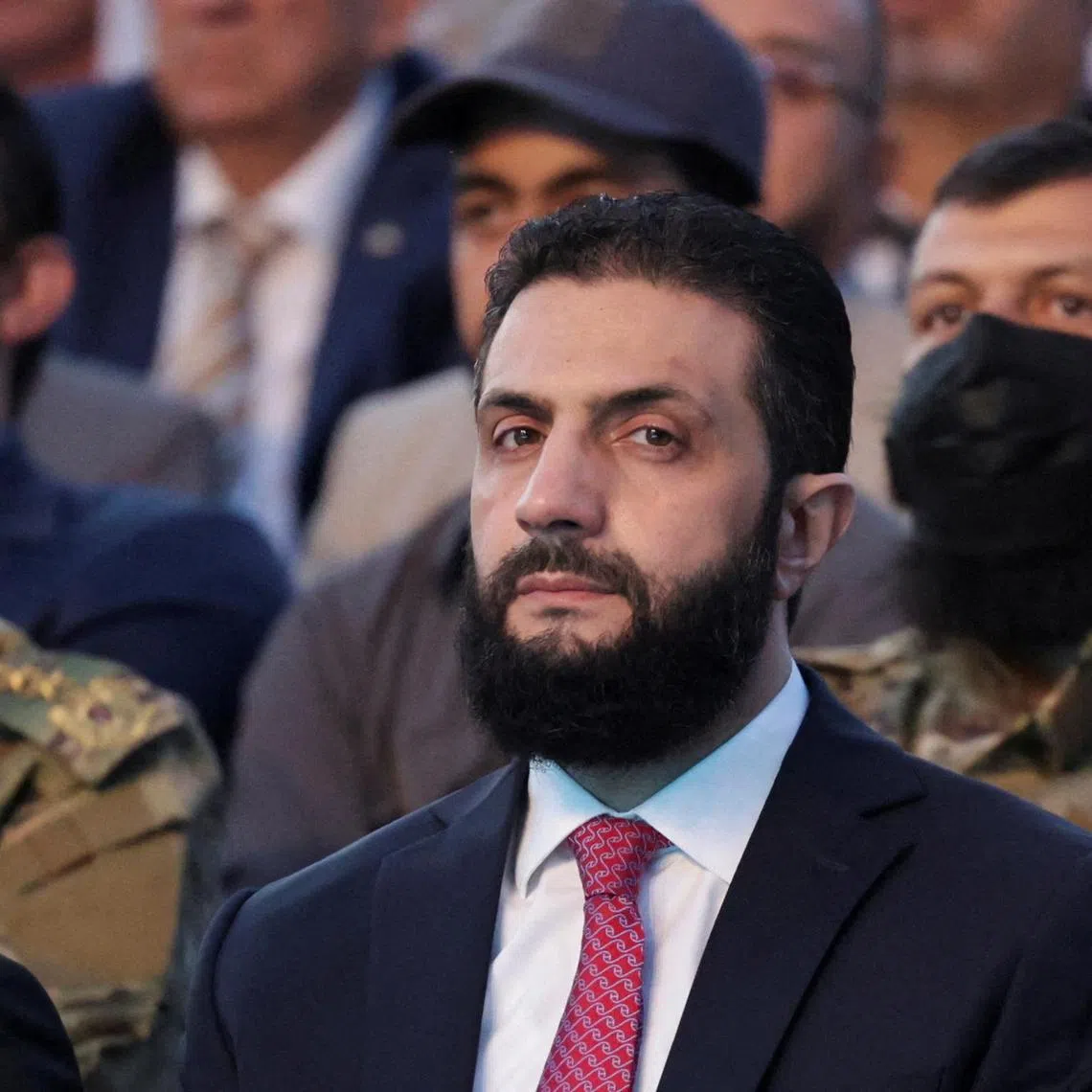 Syria’s interim President Ahmed al-Sharaa looks on as he attends an event marking Syria’s liberation, in Aleppo, Syria on May 27, 2025.