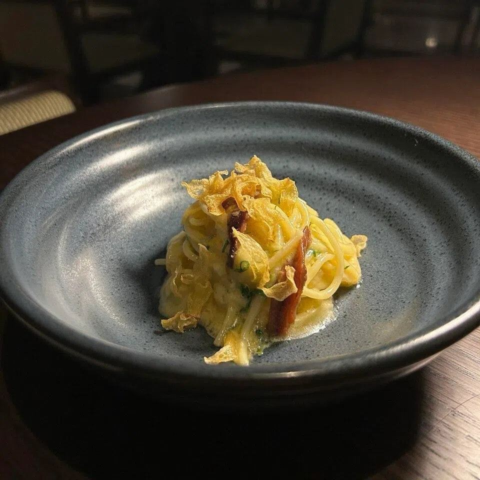 Spaghettini with anchovies and fontina cheese fondue from Empire Grill. 