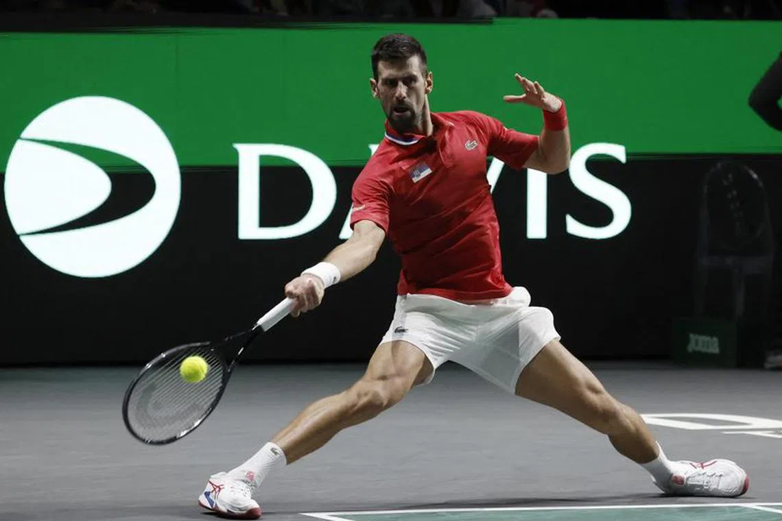 Tennis - Davis Cup - Finals - Serbia v Britain - Palacio de deportes Martin Carpena, Malaga, Spain - November 23, 2023 Serbia's Novak Djokovic in action during his match in the quarter final against Britain's Cameron Norrie REUTERS/Jon Nazca