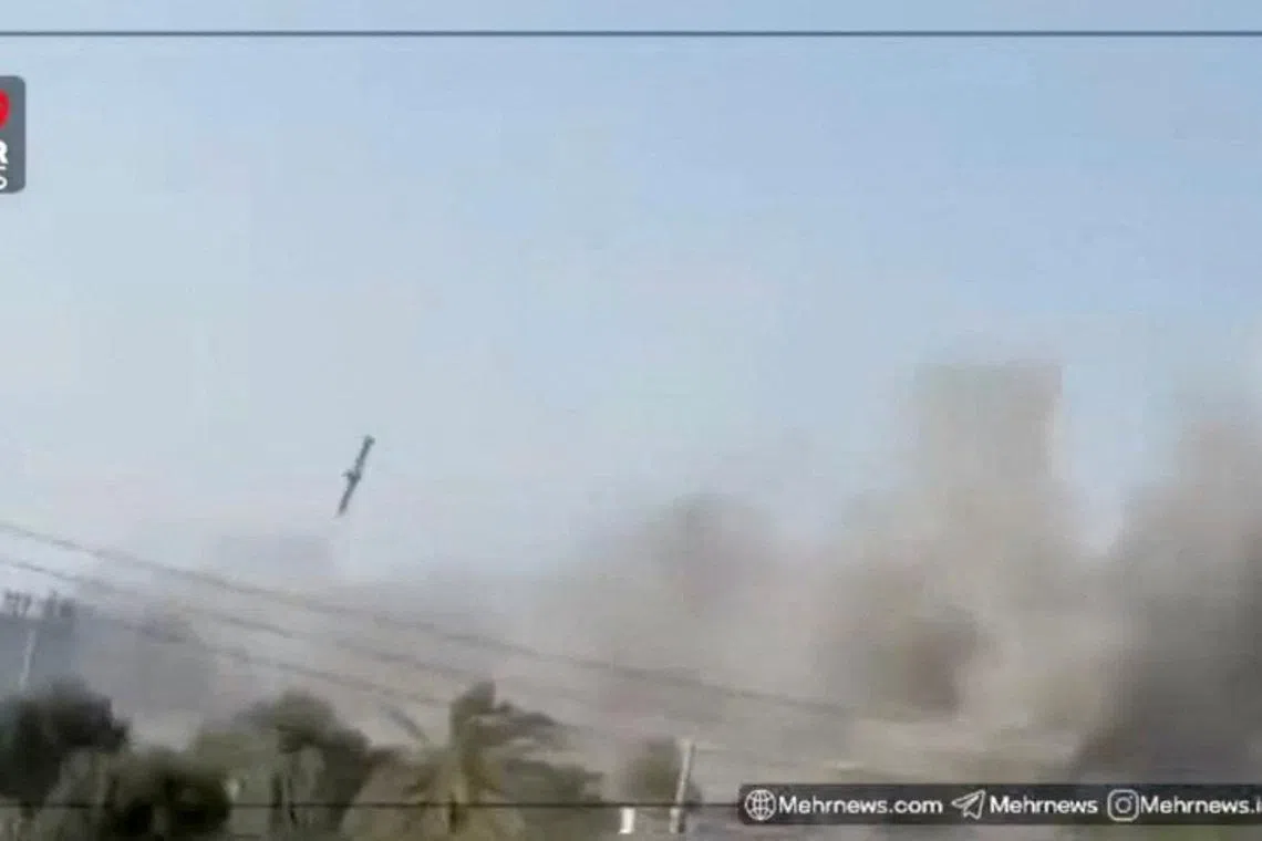 FILE PHOTO: A still image from video shows what experts say to Reuters appears to be a U.S. Tomahawk missile hitting near the Shajareh Tayyebeh girls' school in Minab, Hormozgan province, Iran, February 28, 2026, amid the U.S.-Israeli conflict with Iran. MEHR NEWS/Handout via REUTERS  THIS IMAGE HAS BEEN SUPPLIED BY A THIRD PARTY. MANDATORY CREDIT. NO RESALES. NO ARCHIVES. MUST NOT OBSCURE LOGO.   VERIFICATION: - Reuters confirmed the location from the buildings, trees, utility poles, wall and road layout, which matched satellite imagery of the area.  - Coordinates from where the video was taken: 27.105714752109524, 57.08551574115519.  - The date when the video was filmed was confirmed from the verified aftermath visuals and satellite imagery taken on the morning of February 28, which showed intact buildings at the location of the strike.  - Smoke visible in the video before the missile strike is coming from the direction of the school.  - Two experts told Reuters that the missile seen in the video appears to be the U.S. Tomahawk missile - Joseph Dempsey, a military analyst with London's International Institute for Strategic Studies, said the missile seen in the video is highly likely to be a variant of the Tomahawk missile and that it doesn't appear to match any other known cruise missile in operation by the countries involved in the conflict.  - Joost Oliemans, a Netherlands-based conflict analyst who specialises in military equipment, told Reuters that based on the available footage, there are no plausible alternative candidates and that Israel and Iran are not among the few countries that operate very similar missiles./File Photo