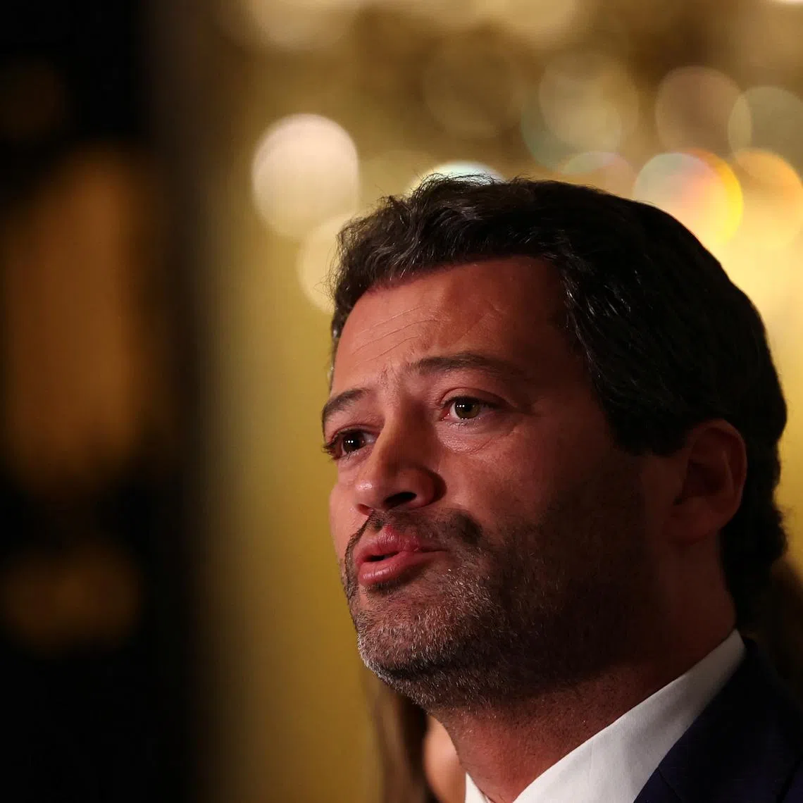 FILE PHOTO: Far right political party Chega leader Andre Ventura talks to the press after meeting with Portugal President Marcelo Rebelo de Sousa in Belem Palace, following the general elections in Lisbon, Portugal, March 18, 2024. REUTERS/Pedro Nunes/File Photo
