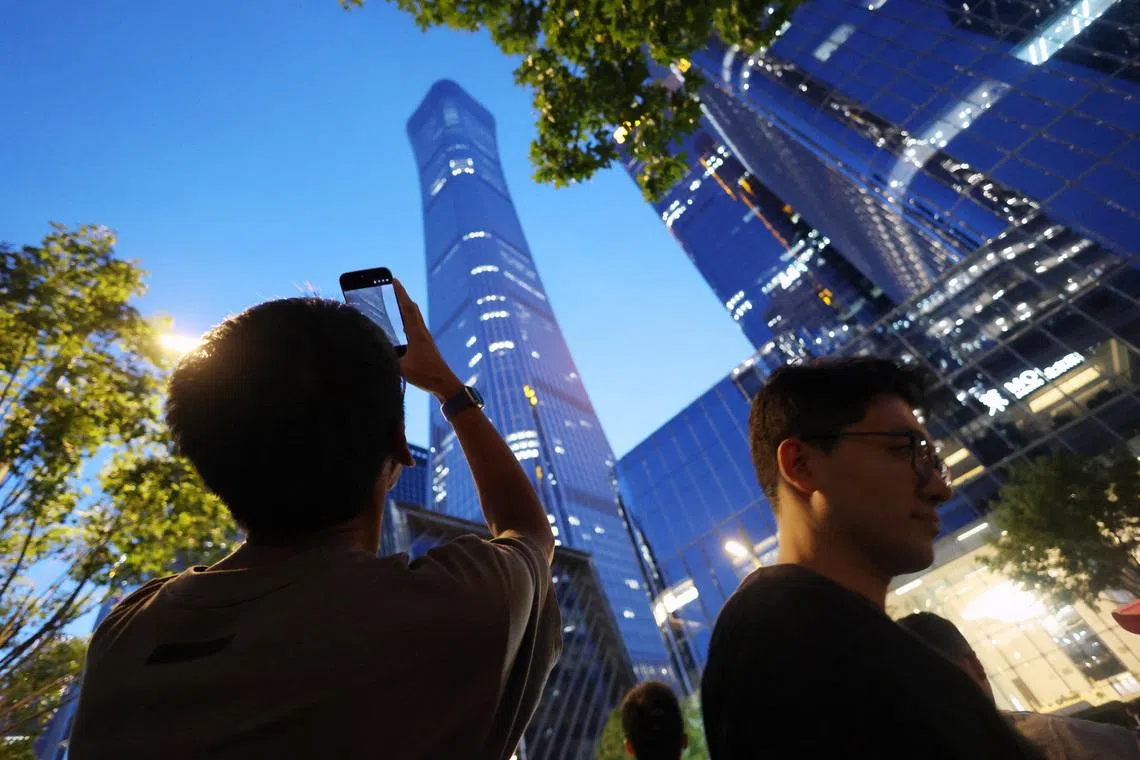 Small aircraft crashes into Beijing’s tallest building, eyewitnesses say