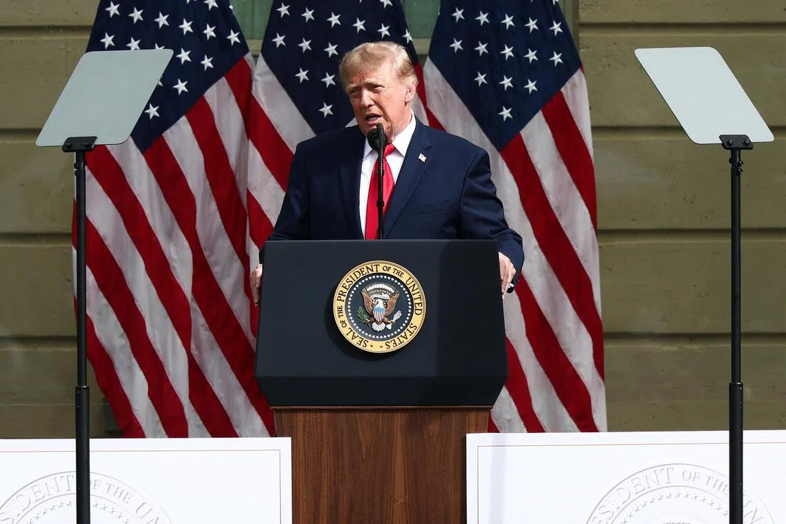 US President Donald Trump speaking during a ceremony commemorating the 25th anniversary of the Sept 11 terrorist attacks in the courtyard of the Pentagon on Sept 11.
