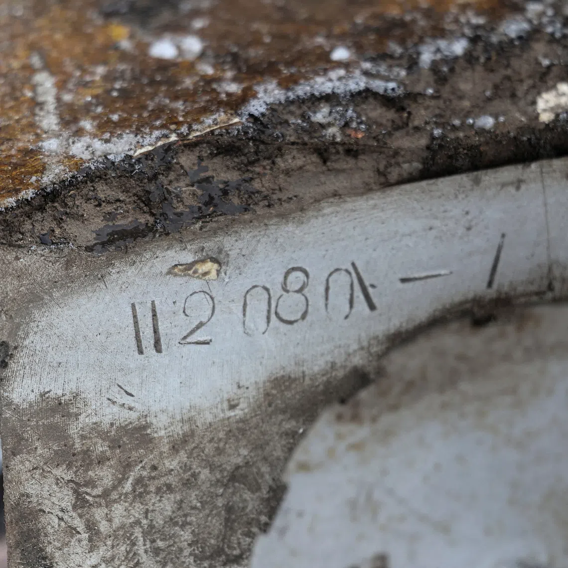 FILE PHOTO: A view shows a part of an unidentified missile, which Ukrainian authorities believe to be made in North Korea and was used in a strike in Kharkiv earlier this week, amid Russia's attack on Ukraine, in Kharkiv, Ukraine January 6, 2024. REUTERS/Vyacheslav Madiyevskyy/File Photo