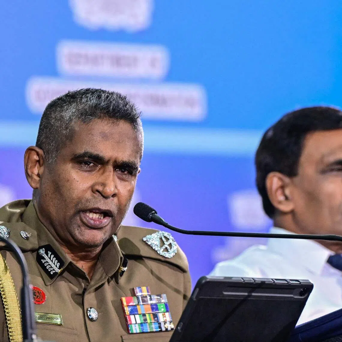 Sri Lanka Podujana Party General-Secretary Sagara Kariyawasam had warned Inspector General of Police Priyantha Weerasooriya (pictured, left) that he could be killed if he continued to be partisan.