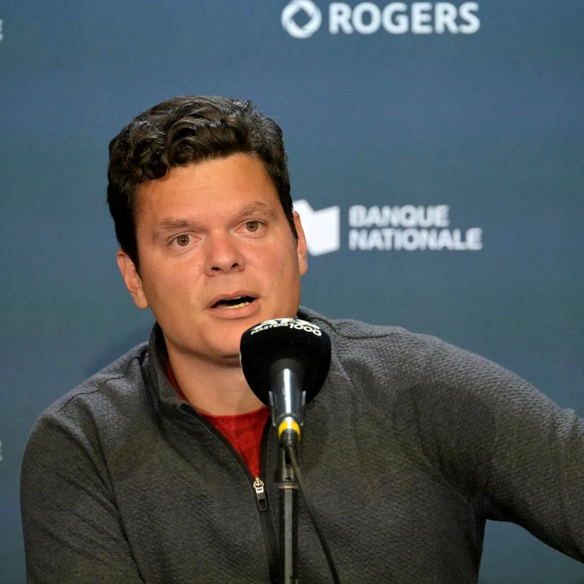 Aug 6, 2024; Montreal, Quebec, Canada; Milos Raonic (CAN) gives a press conference to announce he is pulling out of the tournament at IGA Stadium. Mandatory Credit: Eric Bolte-USA TODAY Sports.