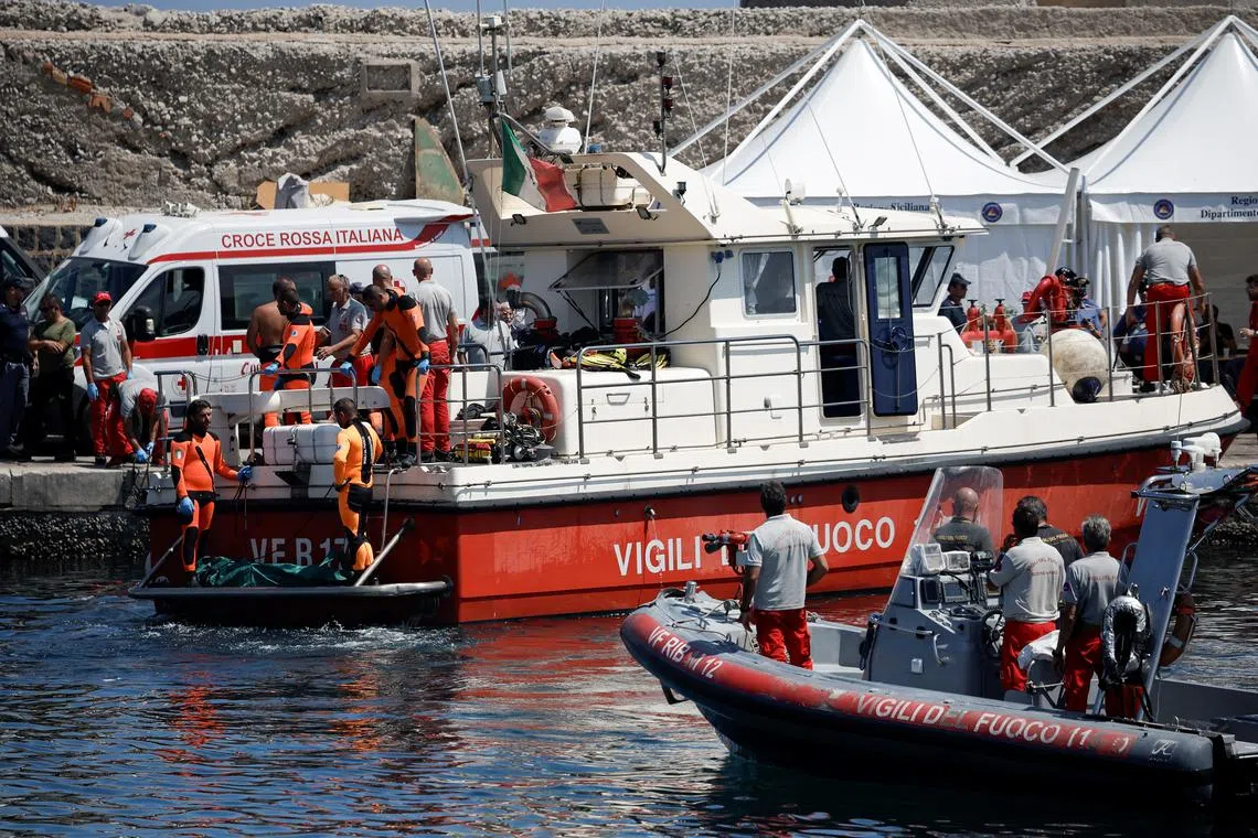 FILE PHOTO: Rescue personnel transport what is believed to be the body of Hannah Lynch, daughter of British tech entrepreneur Mike Lynch, at the scene where a luxury yacht sank, off the coast of Porticello, near the Sicilian city of Palermo, Italy, August 23, 2024. REUTERS/Louiza Vradi/File Photo