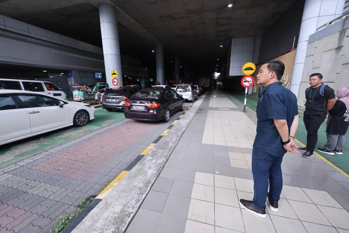 Mr Onn Hafiz surveying the traffic situation at the CIQ. 