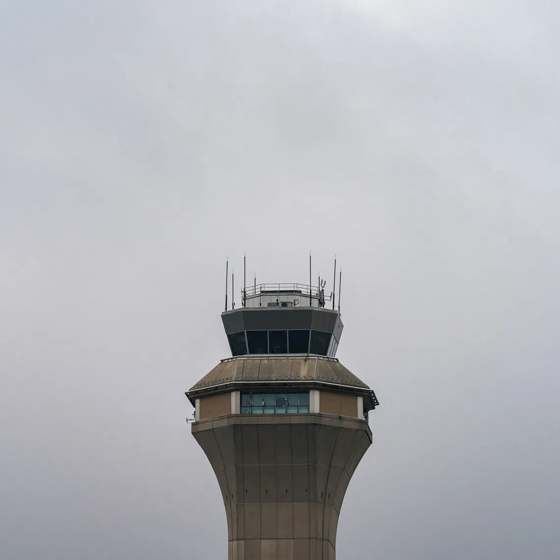 FILE PHOTO: The air traffic control tower at Newark Liberty International Airport is seen in Newark, New Jersey, U.S., May 9, 2025. REUTERS/David 'Dee' Delgado/File Photo