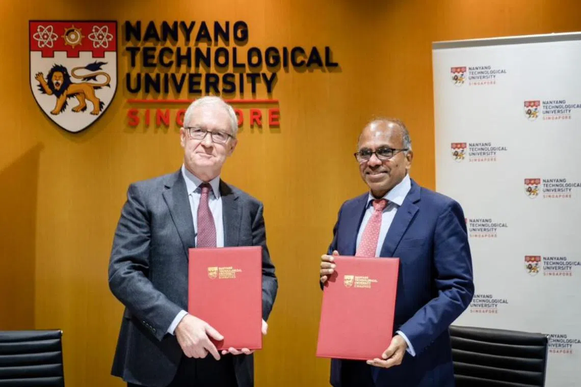 NTU president Subra Suresh and his Imperial College counterpart Hugh Brady inking the agreement between the two institutions.
