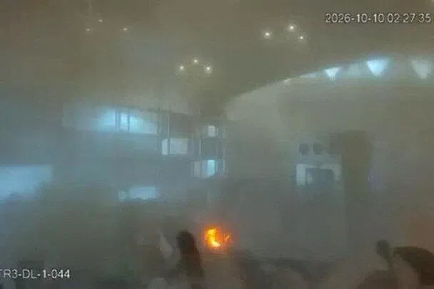 Surveillance footage shows smoke and fire at the moment of an attack at King Khalid International Airport in Riyadh, Saudi Arabia, on Oct 10.