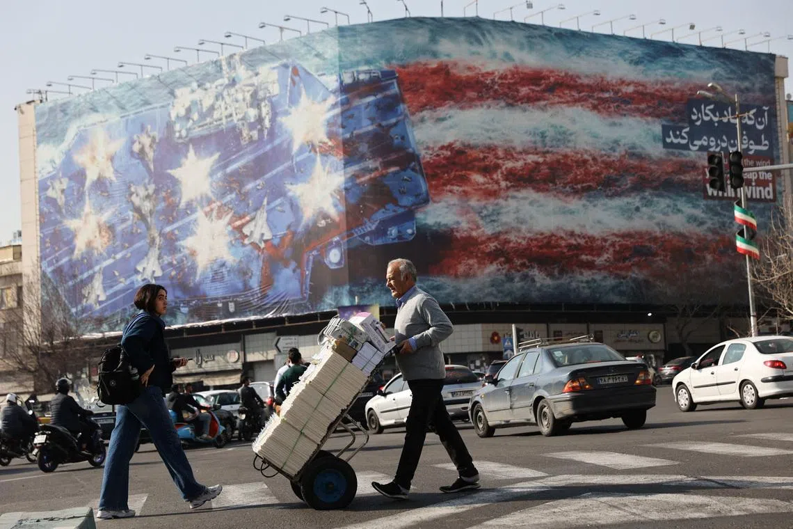 An anti-US billboard in Tehran. US President Donald Trump on Feb 19 gave Tehran a deadline of 10-15 days to make a nuclear deal or face "really bad things".