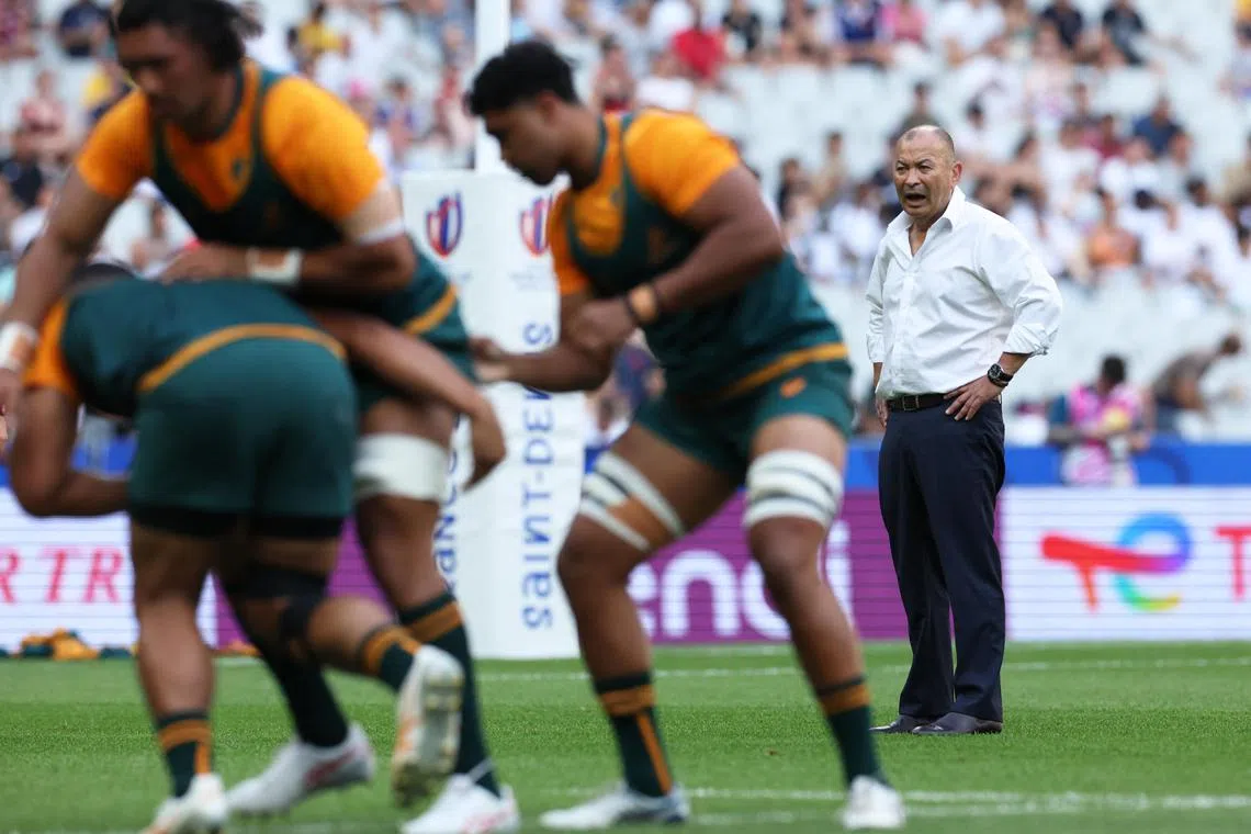 Australia coach Eddie Jones looking on as his side prepare for their Rugby World Cup win against Georgia on Sept 9. He has suggested new rules are turning the sport into a "power contest".