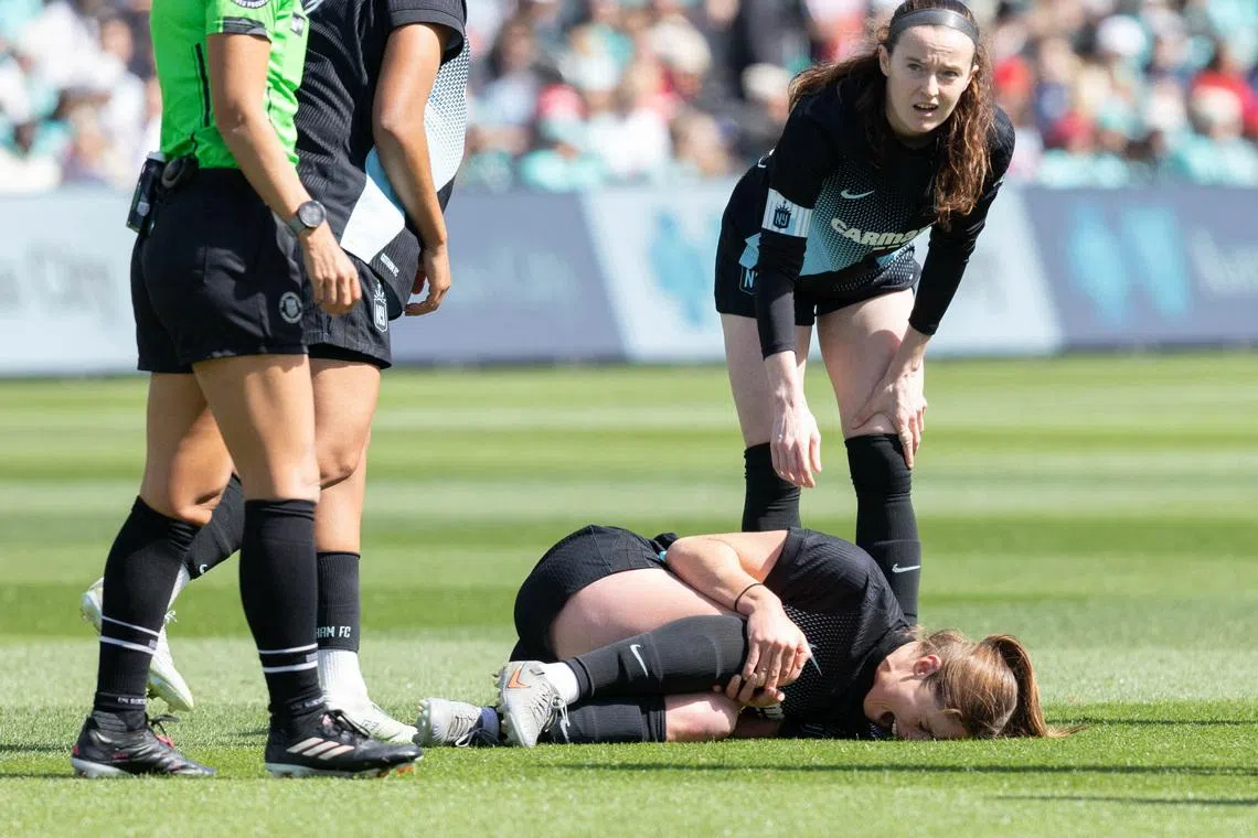 Apr 4, 2026; Kansas City, Missouri, USA; Gotham FC defender Kayla Duran (19) reacts to an apparent injury during the game against the Kansas City Current at CPKC Stadium. Mandatory Credit: Kylie Graham-Imagn Images